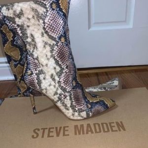 Snakeskin thigh high boots